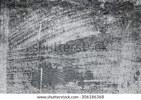 Grey textured concrete wall. Cracked stone wall background
