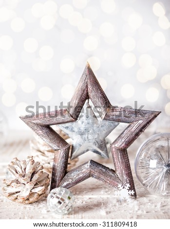 Christmas background with decorative star,Christmas balls and pine cones