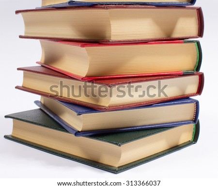 A stack of books isolated on white.