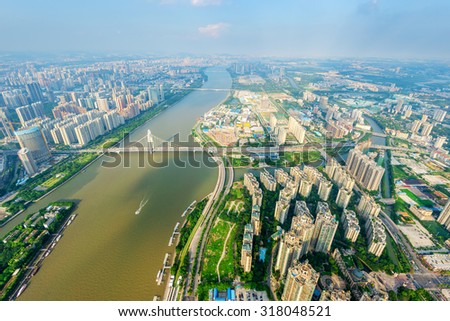 panorama of skyscrapers and a river around the city