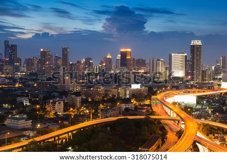Twilight of City skyline with highway overpass intersection, Bangkok Thailand