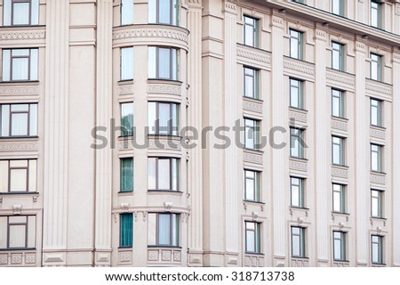Architecture multi-storey building with many windows.