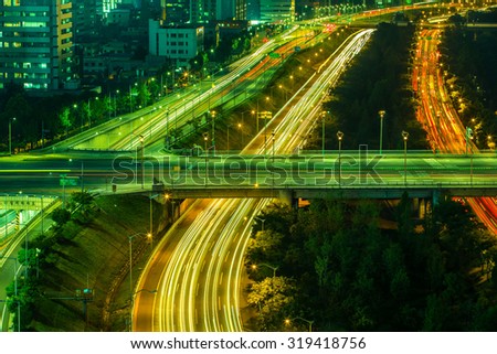 Light trails from vehicles on motorway at night Seoul,Korea