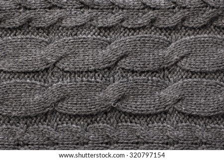 Grey Knitted Wool Background.
