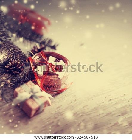 Christmas background with christmas decorations and gift / toned pictures