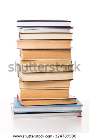 A pile of books on white background