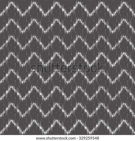 Seamless patter design with traditional ikat repeating ornaments