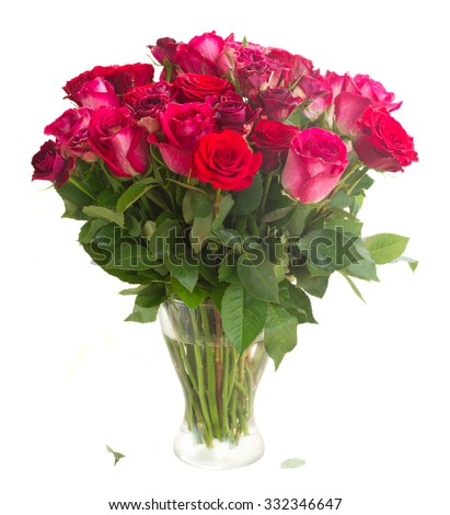 Bunch of red and pink  roses in vase  isolated on white background