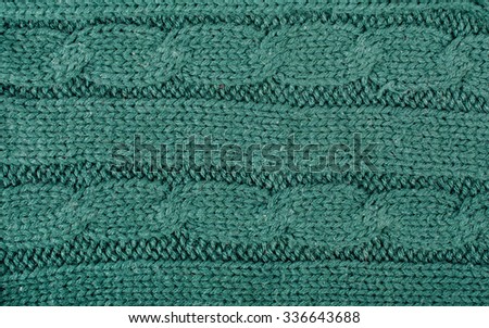 Knitted fabric texture. Green.