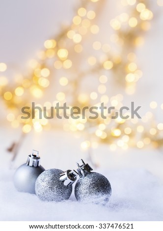 christmas decoration in front of blurred christmas light