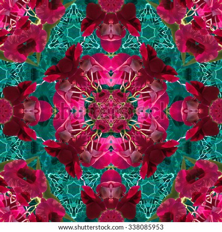 Tropical Floral seamless pattern. Vibrant flowers orchid with kaleidoscope floral ornament on a indigo flowers background. Realistic illustration with effect kaleidoscope.