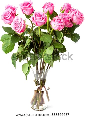 Bunch of pink roses in a glass vase - Isolated
