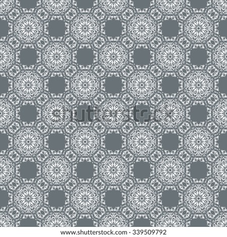 Seamless floral ornament on grey background. Wallpaper pattern