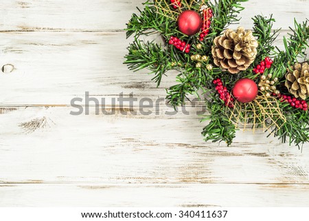 Shabby christmas border with decoration on wood,