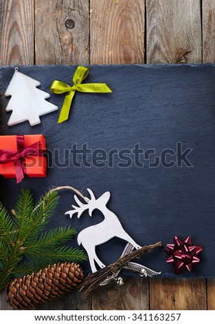 Christmas decoration over wooden background.