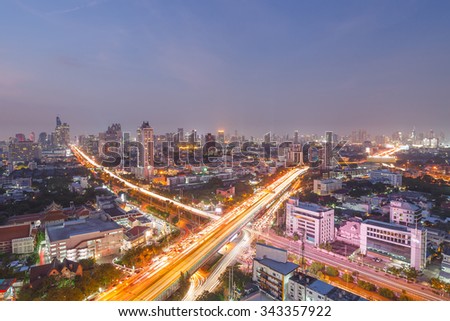 High way x cross Bangkok city business zone ,twilight lighting