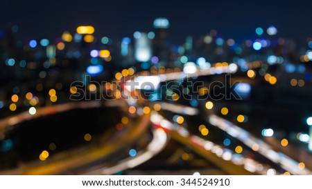 Big City blurred lights intersection at night