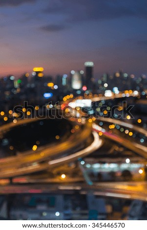 Abstract blurred bokeh lights, city highway interchanged overpass night view