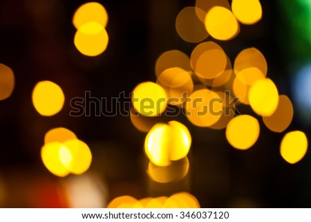Yellow circular reflections of Christmas lights.
