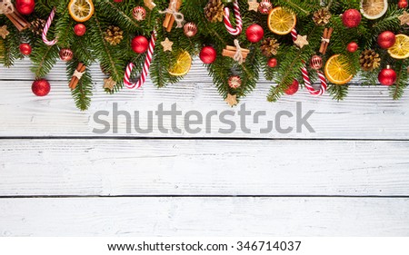 Christmas fir tree decoration on wooden planks background