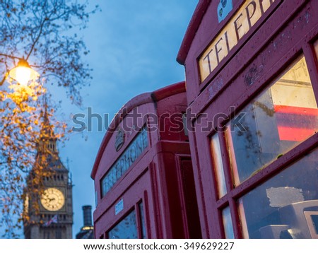 Traditional British phone booth with Big Ben in background - 2