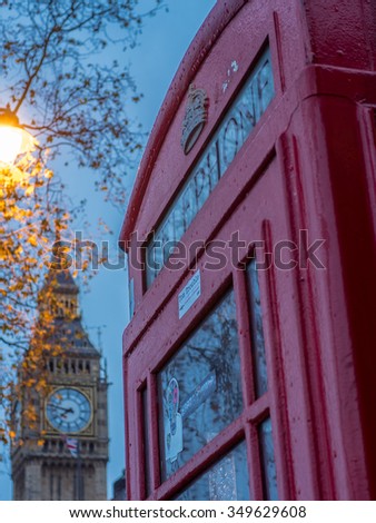 Traditional British phone booth with Big Ben in background - 4