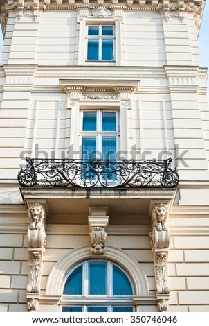 The beautiful pale wall of the luxury house in the city of Lviv, Ukraine