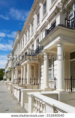White luxury houses facades in London, perspective view
