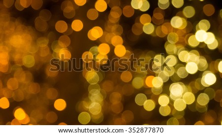 Golden bokeh lights for elegant party.