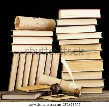 old books on a black background