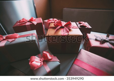 Packaged boxes with gifts closeup.