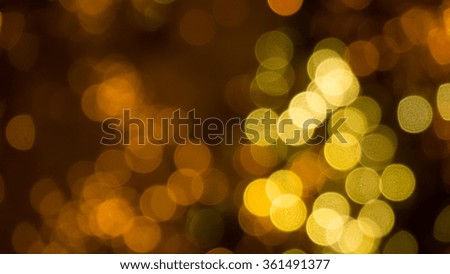 Golden bokeh lights for elegant party.