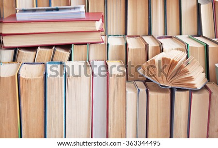 Books in the book shelf closeup. Education concept