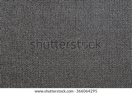 Dark gray fabric texture.