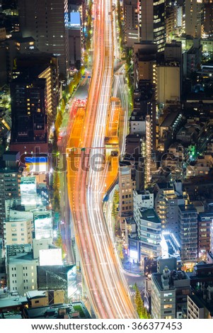 Aerial view cityscape and road during busy hour at night