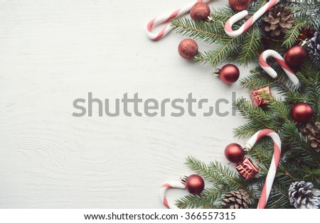 Christmas gift boxes and fir tree branch. Christmas background