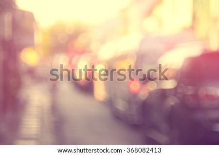 Blur traffic road with bokeh light abstract background.Retro color style.
