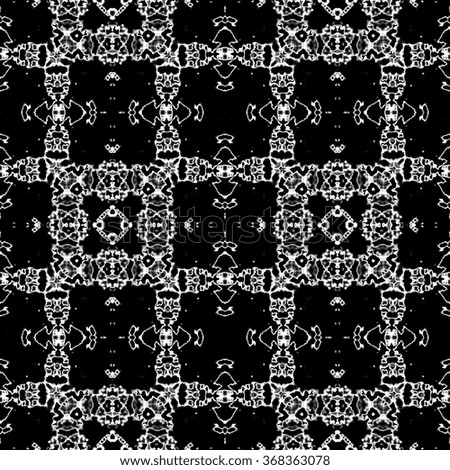 Abstract dark paisley ornament. Seamless pattern or traditional textures. Kaleidoscopic orient popular style 