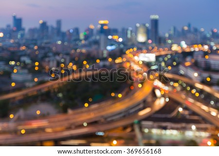 Abstract blurred bokeh lights city motorway intersection night view