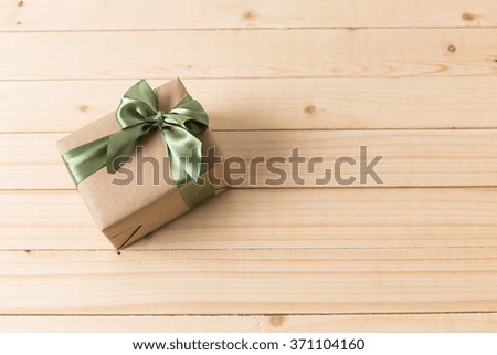 Gift with silk ribbon