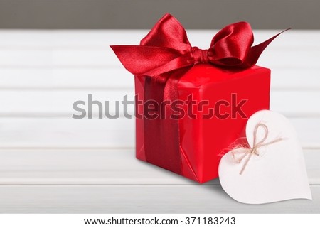 Gift box and heart.