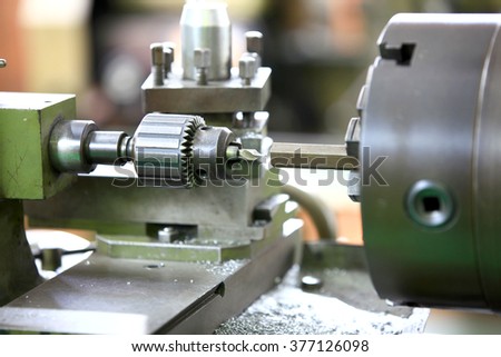 Close up shot of cutting tool on a lathe