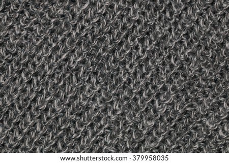 It is Grey knitting wool texture for pattern and background.