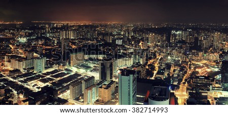 Singapore skyline from at night with urban buildings