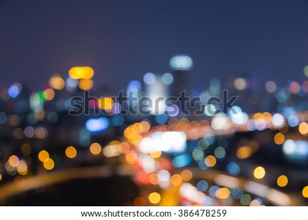 Blurred bokeh city background with highway intersection nigh view