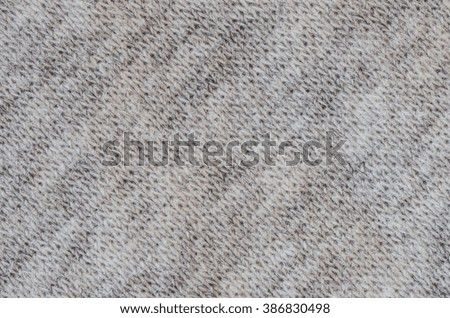 Close up of grey sweater fabric