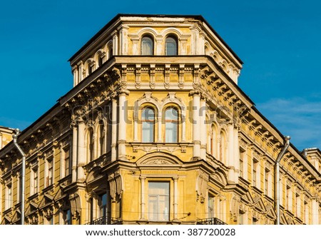 Corner of old apartment building facade in St. Petersburg, Russia
