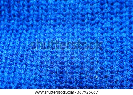 Fabric blue . Old knitting, texture, background , close-up                       