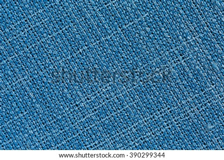 Light blue Linen Fabric Background with clear Texture in diagonal direction of Canvas Close Up