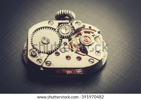 mechanism antique vintage wrist watch beautiful original black and metallic background